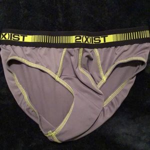 Gray nylon brief by 2(x) ist with neon green trim.